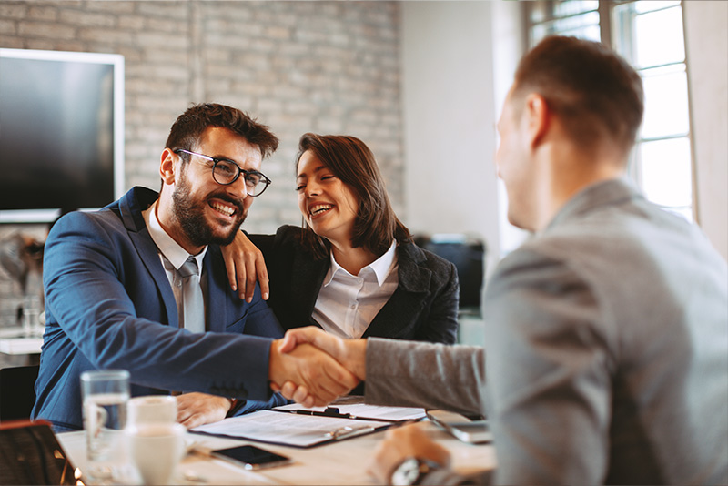 A couple getting a review with a Tandia Financial mortgage expert